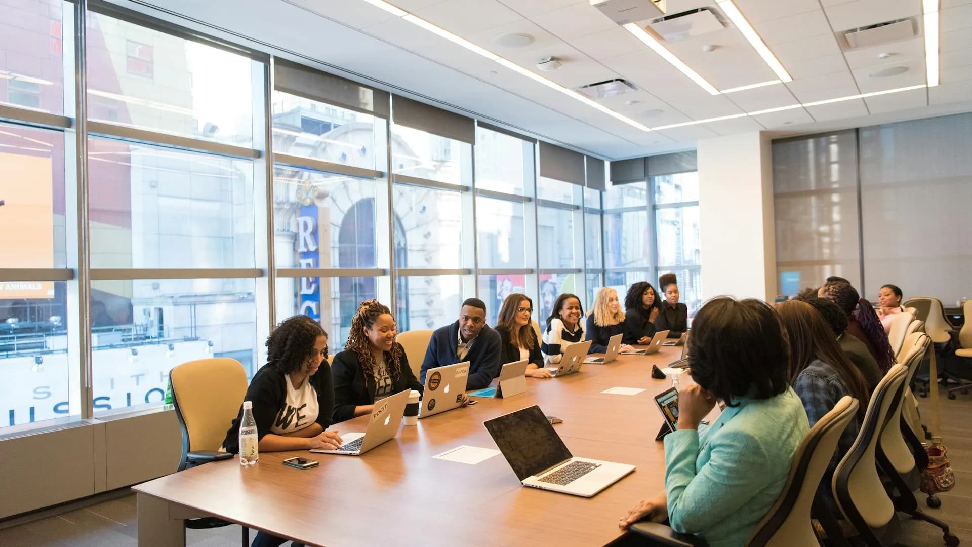 Team member reviewing a conversation on a laptop